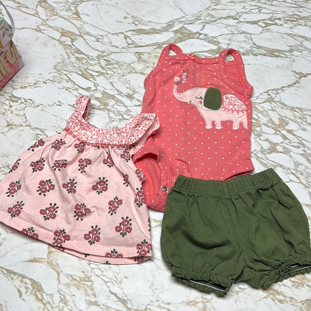 3 piece carters newborn outfit.